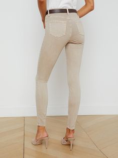 Our signature skinny jean with a longer, 30-inch inseam in an oatmeal beige. Tapered leg hugs from hip to ankle, while the contoured waistband defines and slims the natural waist. High-recovery fabric holds its shape, smoothing the silhouette without sacrificing comfort. | L'AGENCE Marguerite Skinny Jean In Biscuit Green Monday, Black Skinnies, Tapered Legs, Stretchy Material, Jeans Fit, Stretch Denim, Spring Fashion, Oatmeal, Fabric