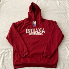 Great Gift For New Indiana Freshmen, Alumni, Or Die Hard Fans. Kangaroo Pockets, Drawstring Hood, Sewn On And Embroidered Fabric Lettering (No Vinyl To Age And Crack). Very Well Made! Questions? Leave A Comment Below! Team-colored Cotton Hooded Top, Cotton Hooded Tops For Fan Gear, Hooded Cotton Tops For Sports Season, Cotton Hoodie For Sports Events, Cotton Sportswear Hoodie, Cotton Varsity Hooded Top, Cotton Hooded Varsity Tops, Red Fan Apparel Hoodie, Red Cotton Hoodie With Letter Print