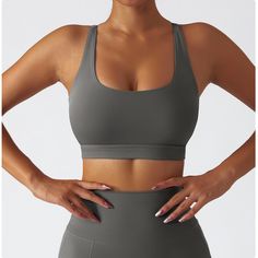 75% Nylon . 25% Spandex Built-in Bra Classic racerback design Designs with a rounded U-shape neckline. Soft. comfortable. skin friendly 4-way stretch. breathable and sweat-wicking Perfect for both sports activities and daily life Stretch T-back Sports Bra With Built-in Padding, Casual T-back Sports Bra For Sports, Scoop Neck Sports Bra With Built-in Padding For Yoga, Nylon T-back Activewear For Yoga, Seamless T-back Activewear For Workout, Gray Fitted Moisture-wicking Activewear, Racerback Activewear With Built-in Padding For Light Sports, High Stretch Seamless Tank Top For Sports, Supportive Racerback Activewear With Built-in Padding