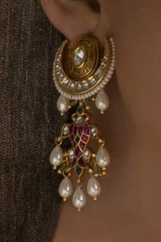 22kt gold plated ornate crescent dangler earrings adorned with hydro polkis, hydro rubies and gleaming shell pearl embellishments. - Aza Fashions Kundan Polki Earrings, Pearl Gold Jewellery, Vintage Gold Jewellery, Big Earrings Gold, Mughal Jewelry, Indian Jewelry Earrings