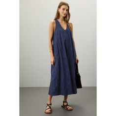 Blue cotton (100% Cotton). Casual dress. V-neck. Sleeveless. Pull on. 52" from shoulder to hemline. Imported. Chic Cotton V-neck Sundress, Cotton V-neck Sundress For Daywear, Cotton Sleeveless V-neck Dress For Beach, Blue V-neck Sleeveless Cotton Dress, Summer Sleeveless V-neck Cotton Dress, Cotton V-neck Sundress, Cotton V-neck Sleeveless Sundress, Cotton V-neck Sleeveless Dress, Cotton Sundress With V-neck