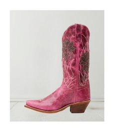 Elevate your western wardrobe with the enchanting Women's Paislee Western Medium Sizes Boots. Crafted for the stylish cowgirl, these boots feature a chic snip toe design that adds a touch of sophistication and flair to any outfit. Constructed with a sturdy leather upper, the Paislee boots seamlessly blend durability with style. The sleek 12" shaft height provides a flattering silhouette, while the pull-on style with convenient pull tabs ensures easy wear for those on the go.  With a comfortable Western Style Pink Mid-calf Boots, Pink Fitted Western Mid-calf Boots, Western Style Fitted Pink Mid-calf Boots, Western Style Fitted Mid-calf Boots For Country Events, Fitted Western Style Mid-calf Boots For Country Events, Pink Round Toe Boots For Ranch, Pink Round Toe Ranch Boots, Spring Ranch Mid-calf Snip Toe Boots, Pink Western Boots For Rodeo