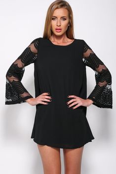 Loose fitting shift dress.Long sleeve.Sleeves are transparent mesh.High round neckline.Transparent mesh detailing alone back of neckline.Soft fabric.Flows freely from the body.Round scalloped hemline.Lined.Polyester. Dress Long Sleeve, Mesh Dress, Dress Long, Soft Fabric, Shift Dress, Dress Black, Round Neckline, Surrealism, Soft Fabrics