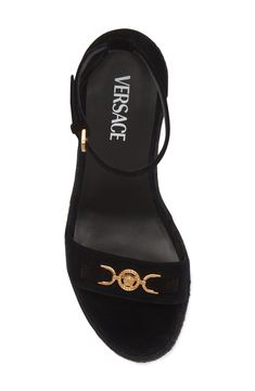 Versace throws it back to the '90s with this ankle-strap sandal branded with Medusa '95 hardware and grounded by a jute-wrapped wedge and platform. 4 1/2" (114mm) heel (size 38.5) 2" platform; 3 1/2" strap height Adjustable ankle strap with buckle closure Leather upper and lining/rubber sole Made in Spain Designer Shoes Luxury Wedge Heel Sandals With Heel Loop, Luxury Wedge Sandals With Buckle Closure, Luxury Wedge Sandals With Ankle Strap And Heel Loop, Designer Wedge Heels With Buckle Closure, Luxury Wedge Sandals With Ankle Strap And Removable Insole, Luxury Wedge Sandals With Block Heel And Heel Strap, Luxury Wedge Sandals With Heel Strap And Block Heel, Luxury Open Heel Wedge Sandals With Heel Strap, Versace Gold