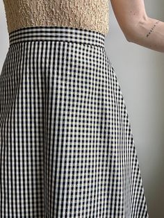 "Get the party started. Vintage 90s High Waist Gingham A Line Maxi Skirt in Black, Off White and Gold. Size 7/8. Fits S/M best. Please refer to measurements below. Acetate & Lurex Blend. Zipper in back for closure. Condition is Pristine.  The colors of the photographs may differ slightly from the actual item colors. Measurements were taken with item laying flat, and are approximate. Waist: 13.5\" Length: 42\" Please message questions prior to purchase- I'm happy to help. Once shipped, sales are Retro Plaid Mini Skirt For Summer, Fitted Gingham Mini Skirt For Summer, Fitted Cotton Skirt For Picnic, Fitted Gingham Skirt For Summer, Retro Full Mini Skirt For Spring, Spring Fitted Houndstooth Skirt, Summer Plaid Flared Skirt, Vintage Plaid Summer Skirt, Plaid Fitted Skirt For Picnic