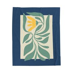 a blue and yellow towel with leaves on the front, in an abstract manner that is hand - painted