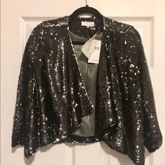 Nwt! Purchased This Black Sequin Blousy/Flowy Jacket At Lord & Taylor And It's Never Been Worn. In Perfect Condition! This Blazer/Jacket Has A Flattering Float Fit With 3/4 Sleeves. Perfect For The Holiday Parties And New Years Eve! Chic Holiday Outerwear For Night Out, Holiday Night Out Long Sleeve Outerwear, Holiday Night Out Outerwear Long Sleeve, Chic Holiday Outerwear With Sequins, Chic Holiday Sequin Outerwear, Winter Sequined Outerwear, Winter Evening Outerwear With Sequins, Fall Evening Sequined Outerwear, Holiday Evening Outerwear With Long Sleeves