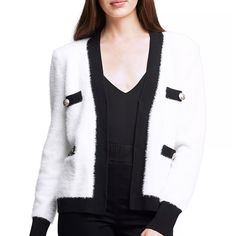 A Polished Cardigan In An Ivory Eyelash Knit Trimmed In Black. Embossed Gold Dome Buttons Detail The Black Pocket Accents, Adding An Elevated Tone. Infused With A Touch Of Merino Wool And Cotton, This Luxurious V-Neck Design Fastens In Front With A Modern Hidden-Hook Closure. Worn Only Once. White Formal Cardigan For Winter, White Formal Winter Cardigan, Chic White Formal Cardigan, White Cardigan For Workwear In Fall, White Cardigan For Work In Fall, Feminine Definition, Great Neck New York, Cool Winter Color Palette, Black And White Cardigan