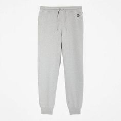 These men's tracksuit bottoms are made in a cotton/polyester blend, providing the comfort and breathability of cotton with the crisp finish of polyester. These sweatpants have a casual style, adjustable drawstring in the waistband, and ribbed ankle cuffs..83% cotton, 17% polyester Ribbed cuffs Ribbed waistband with drawstring Embroidered Timberland® tree logo on the hip Two-pocket style Regular fit Leisure Cotton Joggers With Ribbed Cuffs, Gray Cotton Joggers For Leisure, Cotton Activewear With Drawstring For Jogging, Gray Cotton Sweatpants For Leisure, Cotton Drawstring Sweatpants Sportswear, Cotton Drawstring Sweats For Jogging, Gray Cotton Sweatpants For Jogging, Gray Cotton Sweats For Jogging, Cotton Drawstring Joggers Sportswear