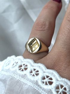 Finely detailed Antique French 18k Gold Signet Ring engraved with a family crest heraldic geometric motif. It is hallmarked with a French Eagle's Head Hallmark Indicating a Minimum Fineness of 18k Gold. The face of the ring measures 10 by 10 mm.  The ring is in very good condition and was lightly cleaned and polished. Weight: 4.86 grams Ring size: US 5 (resizable upon request) Good antique conditions. Thank you for visiting Boudoir Vintage!   Please feel free to contact me for further information or photos.  I offer international shipping. Your item will be packed with extreme care and will be shipped within 3-5 working days. If you are dissatisfied with your item, please feel free to contact me and would be happy to assist.  If you are interested in paying in installments or reserve an it Luxury Gold Engraved Ring, Luxury Yellow Gold Engraved Ring, Luxury Signet Ring For Anniversary, Luxury White Gold Initial Ring, Formal Symbolic Hallmarked Signet Ring, Symbolic Formal Signet Ring Hallmarked, Symbolic Hallmarked Signet Ring For Formal Occasions, Luxury Engraved Signet Ring For Formal Occasions, Classic Yellow Gold Engraved Ring With Coat Of Arms