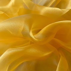 "Yellow Crystal Sheer Organza Fabric by the Yard is a luxurious lightweight & soft fabric with an extremely beautiful shine to it. Organza fabric has a stiffness to it so can hold in place. Create volume apparel, tutu dresses, voluminous gowns, puffy dresses, fluffy skirts, ballet costumes and so much more. Works wonderfully for clothing and seating decor, aisle runners, table clothes, and wedding arches and chair sashes. Due to its stiffness can help to lend volume when sewing gowns, dresses, b Dresses Fluffy, Sewing Gowns, Golden Yellow Dress, Sewing Desk, Runners Table, Deck Pictures, Aisle Runners, Table Clothes, Wedding Arches