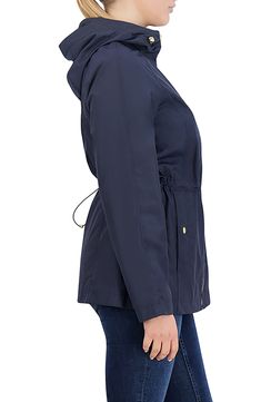 Long commutes and travels abroad are a breeze in an entirely packable rain jacket topped with a protective hood and shaped with a nipped-in drawcord waist. 29" length Front zip closure Drawcord-toggle hood Front snap-welt pockets Drawcord-toggle waist 95% polyester, 5% nylon Machine wash, line dry Imported Solid Weatherproof Windbreaker For Travel, Weatherproof Hooded Raincoat For Travel, Hooded Weatherproof Raincoat For Travel, Weatherproof Functional Parka For Travel, Functional Hooded Raincoat For Travel, Hooded Raincoat With Drawstring Hood For Travel, Casual Travel Raincoat With Drawstring Hood, Travel Weatherproof Windbreaker, Nylon Raincoat For Travel During Rainy Season