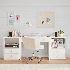 a white desk with two drawers and a chair in front of it on top of a hard wood floor