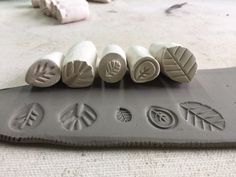 five different types of rubber stamps sitting on top of a table