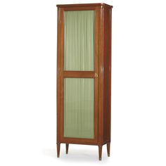 a tall wooden cabinet with glass doors on the top and bottom, against a white background