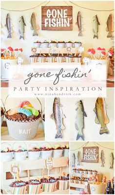 some fish are hanging from the wall and on display in front of other items that include cupcakes