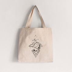 A stylish and trendy alternative to the old brown paper bag, this Camp Diamond tote bag will have other shoppers in line asking you where you got it! KEY FEATURES: - 12 ounce 100% cotton canvas-Approx 19.5"w x 15"h x 5"d- 26" long handles- square gusset bottom- reinforced stitching- hand-drawn Camp Diamond design HAND WASH ONLY and air dry. Machine wash and dry will cause shrinkage. Please allow for slight variations in color and image placement/size. Luxury Beige Coated Canvas Bag, Brown Canvas Adventure Bags, Brown Canvas Bags With Gold-tone Hardware, Beige Eco-friendly Tote Canvas Bag, Everyday Beige Canvas Bag With Eco-friendly Ink, Natural Canvas Bag With Eco-friendly Ink, Artistic Beige Canvas Tote Bag, Brown Paper Bag, Brown Paper