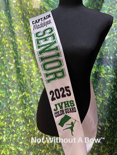 Make the event memorable with a custom senior Color Guard, Majorette, Drill Team, Bank sash! Created with top quality satin ribbon. Size: One size fits most. Total sash length is 36" Ribbon Width: 4" (shown in sample photo)  Sash will NOT be sewn and a safety pin will be included to allow for a custom fit. Customize Your Sash! Please be very detailed in the comment section to avoid delay of processing. -Choose SENIOR layout from photo - clearly note # -Choose ACTIVITY IMAGE from photo  - clearly note # Choose up to 2 colors and note color placement. Note personalized details: Name for sash, year, school abbreviation etc Type school / names EXACTLY how you wish them to appear. INFORMATION TO ASSIST YOU IN YOUR SASH PURCHASE. *Each sash is individually packaged with a safety pin for gift giv Senior Sash Ideas, School Names, Senior Sash, Year Goals, Drill Team, Wedding Sash Belt, Senior Night, Color Guard, Bow Back