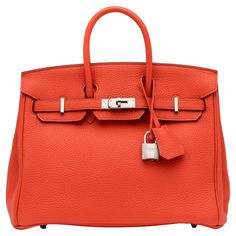 The Hermés Birkin bag embodies the quintessence of style and luxury due to its impeccable design, craftsmanship, and significance. That being said, it is the most iconic and desired piece from the Hermés handbag collection. Birkin Colors Hermes Handbags, Hermes Birkin Rust, Hermes Birkin Orange, Hermes Orange, Hermes 24/24 Bag, Orange Poppy, Handbag Collection, Hermes Handbags, Hermes Bags