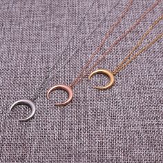 A delicate and understated necklace, this simple and delicate crescent moon can be worn alone or layered with other necklaces. Choose Silver, Gold or Rose Gold Stainless Steel Cable Link Chain (16.5" length with 2" extender) Crescent Moon Pendant Measures 7/8" Minimalist Crescent Charm Necklace With Clavicle Chain, Minimalist Crescent Clavicle Chain Charm Necklace, Minimalist Half Moon Clavicle Chain Necklace, Minimalist Half Moon Necklace With Adjustable Chain, Rose Gold Crescent Moon Charm Necklace, Rose Gold Crescent Necklace With Moon Charm, Minimalist Rose Gold Necklace With Moon Charm, Crescent Moon Necklace Gold, Double Horn Necklace