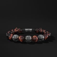 Whether you're looking for a more conservative look or an edgier one, this extraordinary timeless, beaded bracelet of Seekers' design looks amazing at official events and everyday wear.Available in various types of natural stones of the highest AAA quality, hand-selected by our artisans and finished in a specific macrame created by Seekers for a perfect fit on your wrist.In addition to the gemstones, you can choose between 3 different noble metals; 925 Sterling Silver, Gold vermeil and Rhodium (the most expensive metal on earth) on 925 Sterling Silver. Each one with its most spectacular characteristics, brilliance and finish.Choose your stone and your metal and give a definite boost to your outfit. Look perfect on every occasion and transmit your personality and character with this unique Red Tiger, Engraved Metal, Gold Vermeil Jewelry, Red Tigers Eye, Tiger Eye Bracelet, Mens Beaded Bracelets, Vermeil Jewelry, Luxurious Design, Tiger Eye Stone