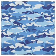 blue camouflage fabric with white and black fish on the front, as well as an image of