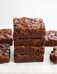 chocolate brownies stacked on top of each other