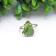 "Welcome To \" GemRawJewels \" Product Type - Rough Ring Gemstone - Chrome Diopside Shape - Organic Shape Cut - Rough Raw Metal - 925 Sterling Silver Weight - 3.56 Gram  More information about our shop: * We have been working since for 15 years, but new to etsy. * You will receive a Ring like the one in the pictures * We are specialist in handmade Jewelry based from Jaipur India. * We make any kind of jewelry such as: Engagement Ring, Wedding Ring, Personalized and Spinner Band Ring, Pendant Necklace, Earrings Etc. * We love to make custom based jewelry. * All jewelry is 925 Stamped * Our Jewelry are made of 925 Sterling Silver(Tested) Customization Option * Over 100+ other gemstones available in store * We accept all type custom order and wholesale order * All types of metal available - c Green Gemstone Sterling Silver Birthstone Ring, Green Tourmaline Jewelry For Promise Ring, Tourmaline Emerald Ring For Gift, Green Crystal Birthstone Ring In Sterling Silver, Green Tourmaline Ring As A Gift, Green Tourmaline Rings As A Gift, Green Tourmaline Rings For Gift, Green Tourmaline Rings As Gift, Rough Ring