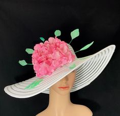 Gorgeous Kentucky Derby Ascot Hat              100% Brand New   Designed & Made in USA         Beautiful hand embellished wide brim hat adorned with green stripped coque rooster feathers and a large pink flower. Each flower is individually hand painted. Colors may differ slightly. This gorgeous hat has a 22.5 inches interior crown circumference.The Brim is 5 3/4 inches.It fits most!    Hat Base Color: White This is a high quality wide brim hat with wire which could hold it's shape.It won't flop in the eyes and face. And it will protect your face and hair from hot sun and wind. It's perfect for outdoor event. Would be great for Wedding, Bridal Shower, Tea Party, Concert,Evening Wear, Belmont,Ascot, Derby day,Races, Church, Art Photography,etc. ** This hat listing is currently Made to Order. Spring Races Sun Hat With Short Brim, High Crown Hats For Spring, High Crown Sun Hat For Spring Vacation, Fitted High Crown Sun Hat For Spring, Pink Sun Hat For Spring Races, Wide Brim Sun Hat For Races In Spring, Wide Brim Sun Hat For Spring Races, Adjustable Sun Hat For Spring Races, Spring Races Wide Brim Boater Hat