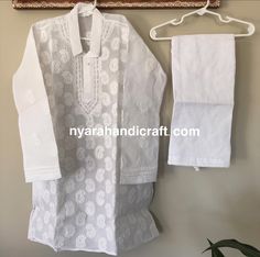 Pure cotton Chikankari set for the little men ! This must have white Kurta Pajama set has very fine all over embroidery on the kurta. Cotton Traditional Wear With Cutwork For Eid, Eid Cotton Sets With Cutwork Details, Diwali Cotton Cutwork Sets, White Cotton Traditional Wear With Chikankari Embroidery, Traditional Cotton Sets With Cutwork, Traditional Cotton Set With Cutwork, White Cotton Traditional Wear With Cutwork, White Cotton Sets With Chikankari Embroidery, Traditional White Cutwork Sets