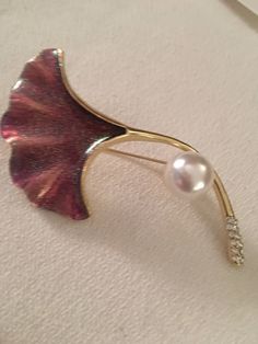 Elegant Pink Glittered Gilded Lily With a Creamy Faux Pearl Goldtone Art Deco Style Fashion Jewelry Brooch Will arrive gifted nicely 🎀 www.mysoulrepair.com Gold Holiday Brooch Jewelry, Elegant Gold Brooches For Festive Occasions, Gold Glamorous Party Brooch, Gold Glamorous Party Brooches, Glamorous Gold Party Brooches, Art Deco Style Fashion, Gilded Lily, Glen Cove, Valentine Cupid