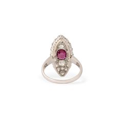 The Story A show stopping antique navette ring filled to the brim with chunky old cut stones. Made from 14k gold, it centers around an old cut ruby weighing approximately 0.80 carats. Surrounding it are 20 Old Mine Cut diamonds ranging in size from 0.06 carats to 0.18 carats each for a total diamond weight of approximately 2.14 carats. The back of the setting are open allowing light to pour in and make the diamonds sparkle bright. We believe this Victorian era ring was initially made in 14k rosy Antique Ruby Rings With Single Cut Diamonds, Antique Ruby Ring With Brilliant Cut, Gold Victorian Ruby Ring With Single Cut Diamonds, Luxury Antique Ruby Ring With Single Cut Diamonds, Victorian Ruby Jewelry With Single Cut Diamonds, White Metal, Victorian Era, Antique Jewelry, Ruby