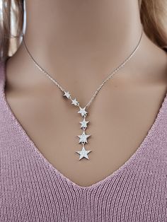 925 Sterling Silver Cubic Zirconia Stars Lariat Necklace Real 925 Sterling Silver NOT SILVER PLATED High Quality Silver Pendant  High polished rhodium finish gives this pendant a stunning shiny look that lasts many years. We have hundreds Silver Jewelry in stock. If you don't see what you are looking , feel free to ask us. Trendy, dainty, luxurious, classic with modern touch, elegant and fancy, fine quality made  925 Sterling Silver cubic zirconia multi stars necklace Descriptions 925 Sterling S Sterling Silver Star-shaped Clavicle Chain, Sterling Silver Star Clavicle Chain, Sterling Silver Star-shaped Jewelry With Adjustable Chain, Sterling Silver Star Jewelry With Adjustable Chain, Silver Star-shaped Jewelry With Adjustable Chain, Lariat Necklaces With Star Charm For Gift, Elegant Star-shaped Lariat Necklace Gift, Elegant Star Lariat Necklace Gift, Silver Charm Necklace With Star Charm