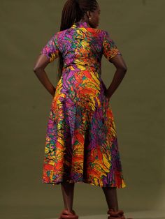 This dress is a testament to our artisans in Nigeria who have meticulously handcrafted fabric sourced from Lagos markets into a garment that transcends fashion and becomes an expression of individuality and a force for good. Fabric: Lightweight non-stretch crisp weave Collared neckline and button placket Short sleeves Midi Length On-seam side pockets Shell: 100% cotton Unlined Care: Hand or machine wash in cold water. Do not bleach. Tumble dry low. Fit: True to size As with all our products, eve A Force, The Fam, Xl Dress, Mommy And Me, Button Placket, Midi Length, Cold Water, Bleach, Force