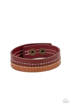 Strands of tan and red leather are stitched together, creating a rugged display around the wrist. Features an adjustable snap closure. Sold as one individual bracelet. Adjustable Brown Bracelet, Adjustable Brown Bracelets For Everyday Use, Adjustable Brown Leather Bracelet With Waxed Finish, Brown Leather Bracelet With Adjustable Band, Everyday Brown Bracelet, Adjustable Brown Bracelet With Waxed Finish, Adjustable Brown Leather Bracelet With Wrist Strap, Adjustable Brown Wrap Bracelet For Everyday, Adjustable Brown Leather Bracelet For Everyday