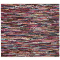 a multicolored rug with fringes on the bottom, and an area rug that has