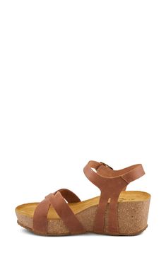 A cork-wrapped platform and chunky wedge heel elevate a weekend-ready leather sandal fitted with an adjustable strap at the ankle. 1 3/4" heel; 1 1/4" platform Adjustable ankle strap with hook-and-loop closure Molded footbed Leather upper and lining/synthetic sole Made in Spain Casual Platform Sandals With Cork Material, Casual Cork Platform Sandals, Casual Cork Platform Wedge Sandals, Summer Ankle Strap Cork Sandals, Summer Cork Sandals With Ankle Strap, Casual Footbed Sandals With Cork-bed Midsoles And Wedge Heel, Cork Wedge Sandals With Heel Strap, Cork Sandals With Heel Strap And Wedge Heel, Open Toe Cork Wedge Sandals With Heel Strap