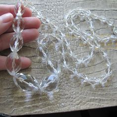 "Art Deco Flapper Long Faceted Crystal Graduated Bead Necklace, Sterling Filigree Clasp. 30 IN Crystal Beads. Authentic 1920's to 1930's Big Clear Crystal Beads, perfect for a #GatsbyWedding or #Titanic Themed Event. Rare to find these in this size. Hand strung and knotted long ago, will ideally need to be restrung at some point in time. Beautiful crystal beads. Affordable \"pools of light\". I can't find another strand such as these available currently online (RL or here). 30 1/2 IN Length Larg Crystal Bead Necklace, Faceted Crystal, Titanic, Bead Necklace, Clear Crystal, Crystal Beads, Jewelry Art, Beaded Necklace, Fine Jewelry