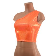 "Four way stretch sparkly orange spandex, in a one shoulder design. This top is holographic, dazzling in the sunlight, and UV glow under blacklight! This item is made to order. Ships out within 5 days of purchase. Womens Sizing (See below for instructions on where measurements should be taken) XXS: Bust 29\"-30\" / Waist 22\"-23\" / Hips 30\"-32\" Extra Small: Bust 31\"-32\" / Waist 24\"-25\" / Hips 33\"-35\" Small: Bust 33\"-34\" / Waist 26\"-28\" / Hips 36\"-37\" Medium: Bust 35\"-37\" /Waist Sleeveless Turtleneck Outfit, Winx Cosplay, Magical Girl Outfit, Glitter Shorts, One Shoulder Crop Top, Turtleneck Outfit, Orange Fits, Leather Crop Top, Sparkle Top