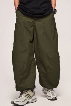 Price: $42.00 Material: 40% Nylon + 60% Polyester Size: S, M, L, XL, 2XL Color: Black, Army Green Applicable Season: Spring, Summer Military Style Wide Leg Cargo Bottoms, Military Cargo Style Wide Leg Bottoms, Military Wide Leg Cargo Bottoms, Green Wide-leg Utility Cargo Pants, Baggy Military Style Cargo Pants With Wide Leg, Baggy Military Wide Leg Cargo Pants, Relaxed Fit Cargo Parachute Pants, Military Style Baggy Wide Leg Cargo Pants, Baggy Military Style Wide Leg Cargo Pants