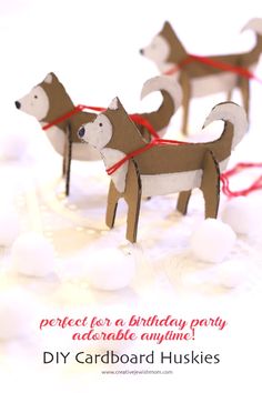 two paper dogs tied to strings on top of each other with the words, perfect for a birthday party adorable anytime diy cardboard hukies