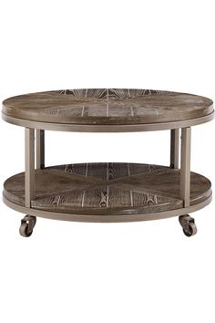 an oval coffee table with wheels on each side and a circular wooden shelf underneath it