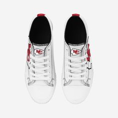 Low tops. High spirits. No matter the final score, you'll always be winning with the Kansas City Chiefs Women's Big Logo Low Top White Canvas Shoes on your feet. Features All-over white design so you can rep the team in style Team logo displays on tongues, in case there were any doubts where your allegiances lie Bold team logo displays on outer sides for a little extra team spirit Team-colored stripe accents on midsoles and heels for added fan fashion Adjustable laces for security Closed, round White Canvas Shoes, High Spirits, Fan Fashion, Cincinnati Bengals, San Francisco 49ers, Kansas City Chiefs, Toe Designs, Pittsburgh Steelers, White Canvas