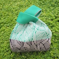 Horizon Green Knot Bag - Made In Hawaii Hawaiian Bags, Fabric Folds, Japanese Knot, Knot Bag, Beach Getaways, The Horizon, Green Bag, Geometric Design, New Day