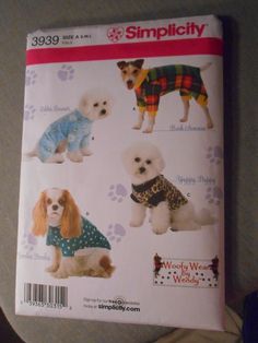 a book with pictures of dogs wearing sweaters