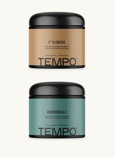 two jars of tempo coffee sitting next to each other on a white background