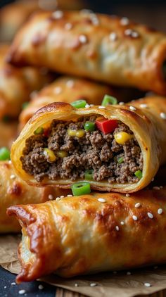 some tasty looking pastries with meat and veggies