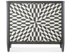 a black and white cabinet with geometric design