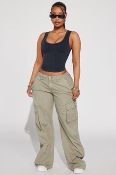 Available In Black And Sage. Cargo Jogger Pant Low Rise Button & Zip Closure Cargo Pockets Side Ruched Hem Hand Pockets Elastic Side Tie Semi-Stretch 98% Cotton 2% Spandex Imported | Don't Stop Me Ripstop Cargo Pant in Sage size 2X by Fashion Nova College Campus Outfit, Green Cargos, Finally Free, Campus Outfit, First Day Of School Outfit, Fashion Nova Outfits, Free Fashion, Cargo Joggers, Clothes Women