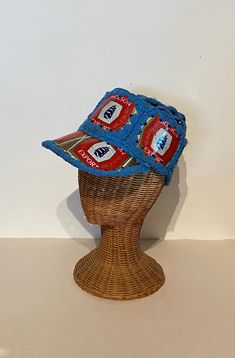 Vintage Molson Beer can crocheted Baseball Cap Vintage recycled Molson Beer cans and blue acrylic yarn, hand crocheted into this American style Baseball Cap This hat does not have a way to adjust its size but, seems that it would fit an average sized head, there is some give with the crocheted yarn. There are a total of 5 'medallions' around the cap, 1 on the top and the peak/bill is a strip of the can with 2 'medallions' on. This is a vintage piece and does have signs of wear but is a great pie Blue Yarn Cap, Blue Handmade Outdoor Hat, Handmade Blue Outdoor Hat, Blue Crochet Hat One Size Fits Most, Blue Crochet Beach Cap, Blue Crochet Cap, Handmade Blue Crochet Cap, Style Baseball Cap, Beer Cans